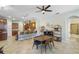 Kitchen breakfast nook with seating and view into the living room at 32619 View Haven Ln, Sorrento, FL 32776