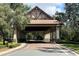 Gated community entrance with covered roadway at 32619 View Haven Ln, Sorrento, FL 32776