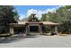 Gated community entrance with elegant architectural details at 32619 View Haven Ln, Sorrento, FL 32776