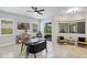 Bright dining area with window seating and backyard view at 32619 View Haven Ln, Sorrento, FL 32776