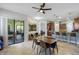 Casual dining area with sliding glass doors leading to a patio at 32619 View Haven Ln, Sorrento, FL 32776