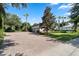 Brick paved driveway and detached garage with landscaping at 32619 View Haven Ln, Sorrento, FL 32776