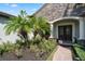 Elegant entryway with double doors and brick pathway at 32619 View Haven Ln, Sorrento, FL 32776