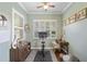 Home gym with exercise bike and natural light at 32619 View Haven Ln, Sorrento, FL 32776