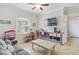 Spacious playroom with plenty of storage and comfy seating at 32619 View Haven Ln, Sorrento, FL 32776