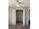 Open closet with shelving for optimal storage at 2444 Summerfield Way # 1, Kissimmee, FL 34741