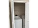 Convenient laundry closet with a washer and dryer, providing practical in-home laundry solutions at 2444 Summerfield Way # 1, Kissimmee, FL 34741