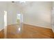 Large bedroom featuring wood flooring and multiple entry points at 4606 Park Eden Cir, Orlando, FL 32810