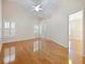 Spacious bedroom with wood floors and access to a bathroom at 4606 Park Eden Cir, Orlando, FL 32810