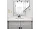 Bathroom featuring a white vanity with modern hardware and a large mirror at 225 Terrace Hill Blvd # 1C, Debary, FL 32713