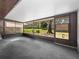 Enclosed screened patio overlooking the yard at 225 Terrace Hill Blvd # 1C, Debary, FL 32713