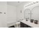 Clean bathroom with soaking tub, double vanity, and stylish fixtures at 273 Willow View Dr, Davenport, FL 33896