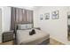 Cozy bedroom with a double bed, nightstands, and modern decor at 273 Willow View Dr, Davenport, FL 33896