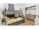 Bedroom with bunk beds, dresser, and closet at 273 Willow View Dr, Davenport, FL 33896