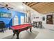 Spacious game room, pool table, and additional seating at 273 Willow View Dr, Davenport, FL 33896
