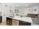 Modern kitchen with island, stainless steel appliances, and stylish cabinetry at 273 Willow View Dr, Davenport, FL 33896