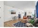 Spacious living area with a large TV, comfortable seating, and access to dining area at 273 Willow View Dr, Davenport, FL 33896