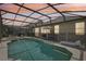 Relaxing screened pool and spa area, perfect for entertaining at 273 Willow View Dr, Davenport, FL 33896