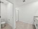 Modern bathroom features tile floors, granite vanity, and a glass-enclosed shower at 3158 Viceroy Ct, Poinciana, FL 34759