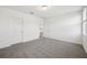 Neutral carpet, white walls and recessed lights fill this spacious bedroom at 3158 Viceroy Ct, Poinciana, FL 34759