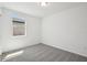 Bright bedroom with neutral carpet, a large window, and ample space for relaxation at 3158 Viceroy Ct, Poinciana, FL 34759