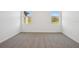 Inviting bedroom with neutral carpet, white walls, and bright windows at 3158 Viceroy Ct, Poinciana, FL 34759
