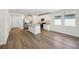 Bright, open-concept kitchen featuring stainless steel appliances and a central island at 3158 Viceroy Ct, Poinciana, FL 34759