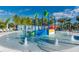 Gathering-friendly splash pad area with fountains, slides, and playful water features for entertainment at 1870 Summer Dr, Davenport, FL 33897