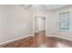 Neutral bedroom featuring hardwood floors and a spacious closet, plus bright natural light at 524 Hockendale Cv, Sanford, FL 32771