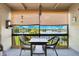 Screened patio with seating offers a tranquil space to enjoy the beautiful waterfront views at 574 Orange Dr # 78, Altamonte Springs, FL 32701