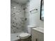 Modern bathroom with marble tiled shower, updated fixtures, and contemporary vanity at 2806 Bonneville Dr, Orlando, FL 32826