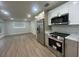 Modern kitchen featuring stainless steel appliances, sleek cabinets, and recessed lighting at 2806 Bonneville Dr, Orlando, FL 32826