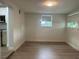 Bright, airy living room with hardwood floors and neutral paint, perfect for relaxation at 2806 Bonneville Dr, Orlando, FL 32826
