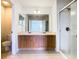 Bathroom features a double vanity and tiled flooring at 2543 Old Kent Cir, Kissimmee, FL 34758