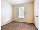 Cozy bedroom with neutral carpeting, a window, and a closet offering a comfortable and private space at 2543 Old Kent Cir, Kissimmee, FL 34758