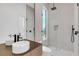 Modern bathroom with a large shower and window at 10424 Pocket Ln, Orlando, FL 32836