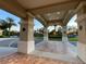 Elegant community entrance with archways and landscaping at 3734 Hasting Ln, Clermont, FL 34711