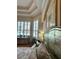 Bedroom with hardwood floors, and tray ceiling at 8734 Crestgate Cir, Orlando, FL 32819
