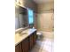 Bathroom with tub, shower, and vanity at 328 Chelmsford Ct, Kissimmee, FL 34758