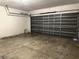 Attached garage with concrete floor at 328 Chelmsford Ct, Kissimmee, FL 34758