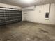 Attached garage with concrete floor at 328 Chelmsford Ct, Kissimmee, FL 34758