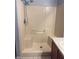 Clean shower stall with built-in seat at 328 Chelmsford Ct, Kissimmee, FL 34758