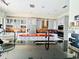 Kitchen with gray cabinets, stainless steel appliances, and a black countertop at 9060 Heritage Bay Cir, Orlando, FL 32836