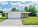 Charming one-story home with a paver driveway, and attached two-car garage at 2240 Center St, Sanford, FL 32771