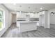 Bright kitchen features white cabinetry, granite countertops, and stainless steel sink at 2240 Center St, Sanford, FL 32771