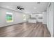 Open floor plan with modern vinyl floors, recessed lighting, and an eat-in kitchen at 2240 Center St, Sanford, FL 32771