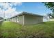 A well-maintained green lawn extends around the side of this home at 2240 Center St, Sanford, FL 32771
