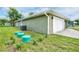 Lush green lawn surrounds the side of this well-maintained house at 2240 Center St, Sanford, FL 32771