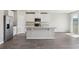 Beautiful kitchen featuring stainless steel appliances, a center island, granite counters, and tile floors at 1709 Forest Run Ln, Auburndale, FL 33823