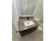 Modern bathroom with a granite countertop, sleek black faucet, and white fixtures at 1780 Converse Ct, Deltona, FL 32738